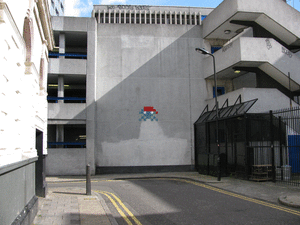 This Space Invader I spotted just off New Oxford Street in London on my way to the British Museum.  I've never been able to find it again, so don't know if it has since been demolished.
